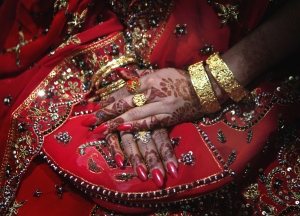 Pakistani bride Najma Khalil folds her h